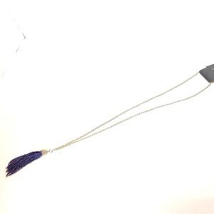 The limited gold necklace with purple frills